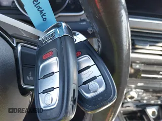 2015 Audi A5 Premium Plus z VIN WAUMFAFH8FN004891, wystawiony jako IAAI lot #41658692 z przebiegiem 179 527 mil mil oraz . Historia ofert i sprzedaży dostępna na DreamBid. Obrazek 11.