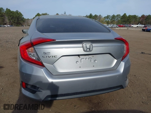 2018 Honda Civic Sedan LX with VIN 2HGFC2F5XJH573938, listed as a IAAI auction lot 42098109 with 69,037 mi miles. Bid and sale history available at carsss.com. Image 16.