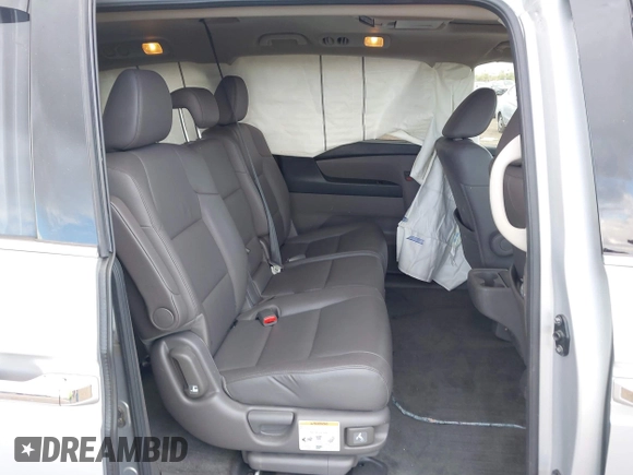 2014 Honda Odyssey Touring with VIN 5FNRL5H93EB066162, listed as a IAAI auction lot 41734783 with 173,063 mi miles and . Bid and sale history available at DreamBid. Image 8.