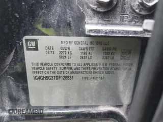 2013 Buick LaCrosse Premium 2 with VIN 1G4GH5G37DF128531, listed as a IAAI auction lot 41754345 with 129,837 mi miles. Bid and sale history available at carsss.com. Image 9.