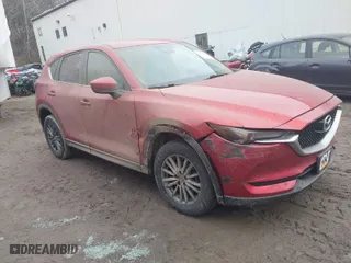 2017 Mazda CX-5 Touring with VIN JM3KFBCL9H0196693, listed as a IAAI auction lot 41136650 with 126,087 mi miles. Bid and sale history available at carsss.com. Image 1.