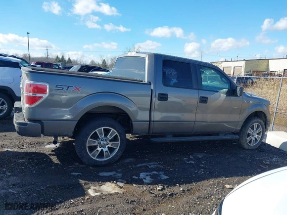 2014 Ford F-150 XL with VIN 1FTFW1EF2EFA76657, listed as a IAAI auction lot 41668284 with 130,226 mi miles. Bid and sale history available at carsss.com. Image 13.