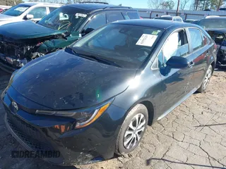2022 Toyota Corolla Hybrid LE with VIN JTDEAMDE2NJ039206, listed as a IAAI auction lot 41592129 with 97,593 mi miles. Bid and sale history available at carsss.com. Image 17.