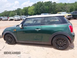 2014 MINI Hardtop with VIN WMWXM5C53ET972847, listed as a IAAI auction lot 42502121 with 165,475 mi miles and . Bid and sale history available at DreamBid. Image 14.