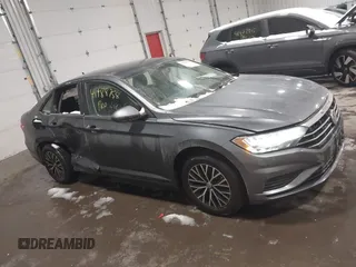 2021 Volkswagen Jetta S z VIN 3VWC57BU6MM001399, wystawiony jako IAAI lot #41488758 z przebiegiem 44 442 mil mil oraz . Historia ofert i sprzedaży dostępna na DreamBid. Obrazek 13.