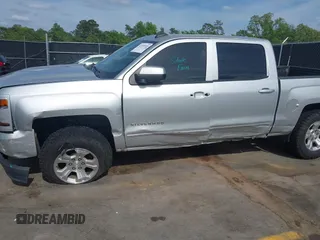 2017 Chevrolet Silverado 1500 LT with VIN 3GCUKREC5HG285689, listed as a IAAI auction lot 42055959 with 128,237 mi miles and . Bid and sale history available at DreamBid. Image 6.