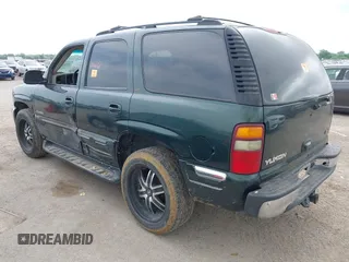 2002 GMC Yukon SLT z VIN 1GKEC13Z62R233154, wystawiony jako IAAI lot #42229172 z przebiegiem Nie podano mil oraz . Historia ofert i sprzedaży dostępna na DreamBid. Obrazek 3.