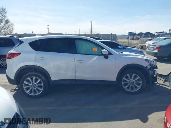 2015 Mazda CX-5 Grand Touring with VIN JM3KE4DY5F0526335, listed as a IAAI auction lot 41756046 with 1 mi miles. Bid and sale history available at carsss.com. Image 13.