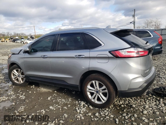 2020 Ford Edge SEL z VIN 2FMPK4J95LBA29912, wystawiony jako Copart lot #82968534 z przebiegiem 104 083 mil mil oraz Szkoda całkowita • Salvage title. Historia ofert i sprzedaży dostępna na DreamBid. Obrazek 2.