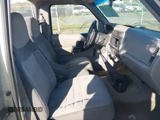 1996 Ford Ranger XL with VIN 1FTCR10A8TTA22056, listed as a IAAI auction lot 42062984 with 215,030 mi miles and . Bid and sale history available at DreamBid. Image 5.