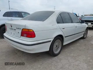1997 BMW 5 Series 540i z VIN WBADE6327VBW50066, wystawiony jako IAAI lot #42149896 z przebiegiem 191 339 mil mil oraz . Historia ofert i sprzedaży dostępna na DreamBid. Obrazek 4.