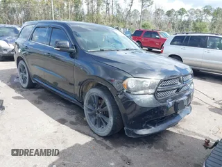 2013 Dodge Durango R/T z VIN 1C4SDJCT6DC678961, wystawiony jako IAAI lot #40811783 z przebiegiem 128 367 mil mil oraz . Historia ofert i sprzedaży dostępna na DreamBid. Obrazek 1.