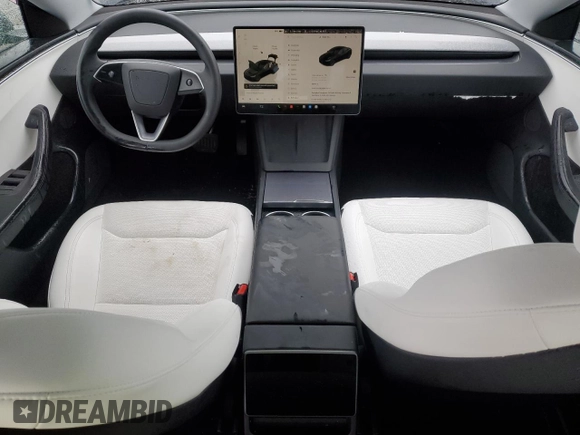 2025 Tesla Model 3 Long Range with VIN 5YJ3E1EB0SF876117, listed as a Copart auction lot 59322455 with 9,022 mi miles and Salvage title. Bid and sale history available at DreamBid. Image 8.