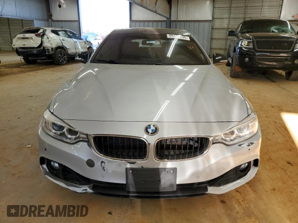 2015 BMW 4 Series 428i z VIN WBA4A5C51FG052009, wystawiony jako Copart lot #89110235 z przebiegiem 156 675 mil mil oraz Szkoda całkowita • Salvage title. Historia ofert i sprzedaży dostępna na DreamBid. Obrazek 5.