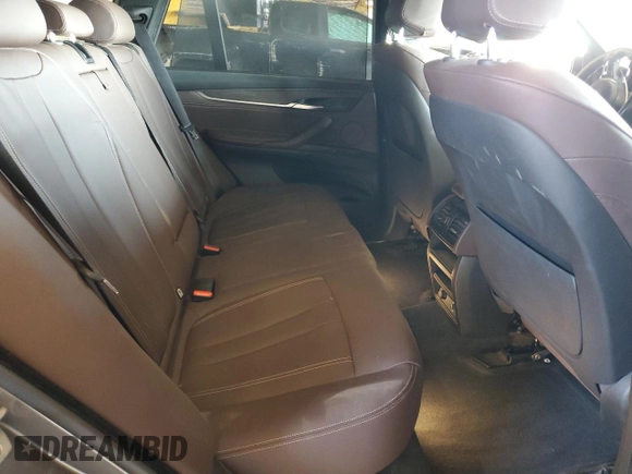 2014 BMW X5 xDrive50i z VIN 5UXKR6C57E0J71844, wystawiony jako Copart lot #54399675 z przebiegiem 79 898 mil mil oraz Szkoda całkowita • Salvage title. Historia ofert i sprzedaży dostępna na DreamBid. Obrazek 10.
