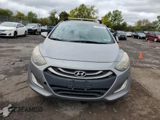 2013 Hyundai Elantra GT with VIN KMHD35LE0DU032356, listed as a Copart auction lot 73402554 with 215,625 mi miles and Salvage Title. Bid and sale history available at carsss.com. Image 5.