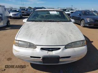 1996 Ford Thunderbird LX with VIN 1FALP62W3TH135238, listed as a IAAI auction lot 41692746 with 136,464 mi miles and . Bid and sale history available at DreamBid. Image 6.