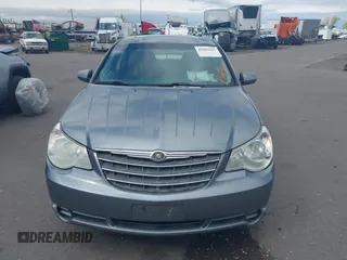 2007 Chrysler Sebring Touring z VIN 1C3LC56R17N521091, wystawiony jako IAAI lot #42202185 z przebiegiem 128 726 mil mil oraz . Historia ofert i sprzedaży dostępna na DreamBid. Obrazek 6.