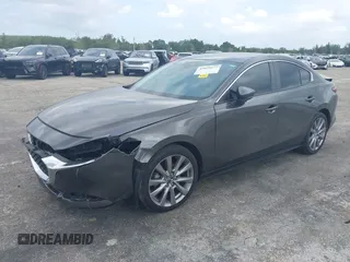 2021 Mazda 3 Select with VIN 3MZBPABL5MM252201, listed as a IAAI auction lot 42029577 with Not Provided miles and . Bid and sale history available at DreamBid. Image 2.