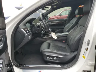 2016 BMW 7 Series 750i with VIN WBA7F0C50GGL99642, listed as a Copart auction lot 64986753 with 69,531 mi miles. Bid and sale history available at carsss.com. Image 7.
