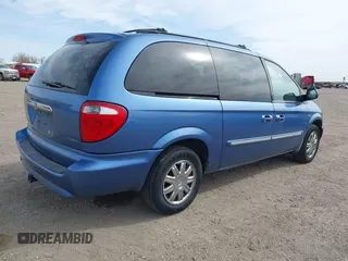 2007 Chrysler Town & Country Touring z VIN 2A4GP54L17R125711, wystawiony jako IAAI lot #41865946 z przebiegiem 169 558 mil mil oraz . Historia ofert i sprzedaży dostępna na DreamBid. Obrazek 4.