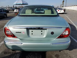 2005 Jaguar XJ with VIN SAJWA79C15SG47018, listed as a Copart auction lot 43087185 with 31,725 mi miles and Salvage Title. Bid and sale history available at carsss.com. Image 6.