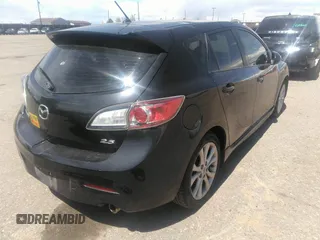 2011 Mazda 3 s Sport with VIN JM1BL1K67B1496970, listed as a IAAI auction lot 42155075 with 158,725 mi miles. Bid and sale history available at carsss.com. Image 4.