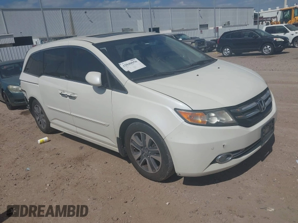 2016 Honda Odyssey Touring Elite with VIN 5FNRL5H98GB102544, listed as a IAAI auction lot 42040050 with 128,957 mi miles and . Bid and sale history available at DreamBid. Image 1.