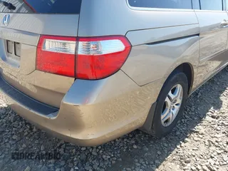 2006 Honda Odyssey EX-L with VIN 5FNRL38666B410188, listed as a IAAI auction lot 42004957 with 156,584 mi miles. Bid and sale history available at carsss.com. Image 17.