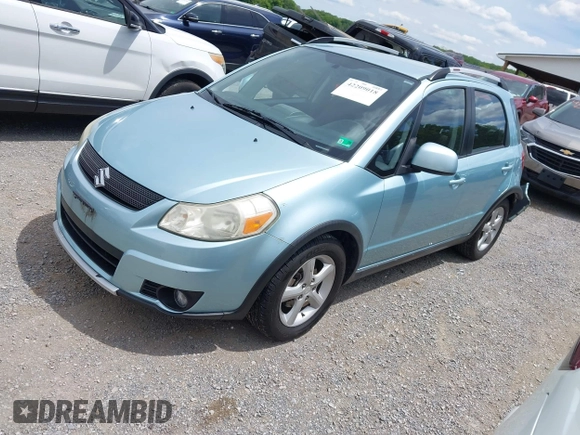 2009 Suzuki SX4 Touring AWD z VIN JS2YB417096201672, wystawiony jako IAAI lot #42209018 z przebiegiem 64 879 mil mil oraz . Historia ofert i sprzedaży dostępna na DreamBid. Obrazek 2.