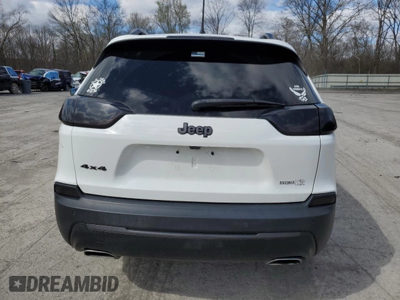 2021 Jeep Cherokee 80th Anniversary with VIN 1C4PJMMX4MD135393, listed as a Copart auction lot 52033255 with 76,546 mi miles and Salvage Title. Bid and sale history available at carsss.com. Image 6.