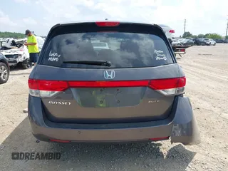 2014 Honda Odyssey Touring with VIN 5FNRL5H99EB138952, listed as a IAAI auction lot 42538833 with 146,959 mi miles and . Bid and sale history available at DreamBid. Image 16.