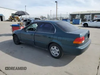 1998 Honda Civic EX with VIN JHMEJ8644WS000994, listed as a Copart auction lot 48209805 with 226,561 mi miles and Salvage Title. Bid and sale history available at carsss.com. Image 2.