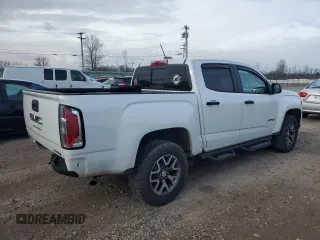 2021 GMC Canyon 4WD AT4 w/Leather with VIN 1GTG6FEN0M1100300, listed as a Copart auction lot 82281314 with 60,086 mi miles and Non Repairable. Bid and sale history available at carsss.com. Image 3.
