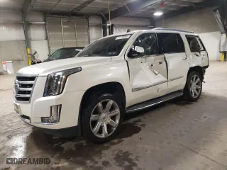 2015 Cadillac Escalade Luxury with VIN 1GYS4BKJ9FR157930, listed as a Copart auction lot 71779094 with 121,077 mi miles and Salvage Title. Bid and sale history available at carsss.com. Image 1.