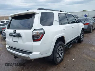 2021 Toyota 4Runner TRD Off Road Premium with VIN JTERU5JR3M5954879, listed as a IAAI auction lot 42291513 with 125,097 mi miles and . Bid and sale history available at DreamBid. Image 4.