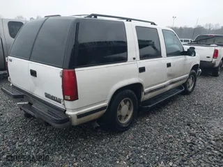1999 Chevrolet Tahoe with VIN 1GNEC13RXXR101766, listed as a IAAI auction lot 41393447 with 387,448 mi miles. Bid and sale history available at carsss.com. Image 4.