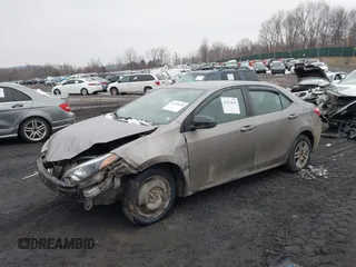 2015 Toyota Corolla L z VIN 2T1BURHE0FC468259, wystawiony jako IAAI lot #41559030 z przebiegiem 299 557 mil mil oraz . Historia ofert i sprzedaży dostępna na DreamBid. Obrazek 17.