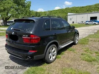 2013 BMW X5 xDrive35i z VIN 5UXZV4C53D0B00978, wystawiony jako Copart lot #56523455 z przebiegiem 170 241 mil mil oraz Czysty tytuł • Clean title. Historia ofert i sprzedaży dostępna na DreamBid. Obrazek 4.