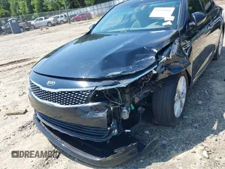 2017 Kia Optima EX with VIN 5XXGU4L36HG123828, listed as a IAAI auction lot 42059856 with 123,305 mi miles and . Bid and sale history available at DreamBid. Image 6.
