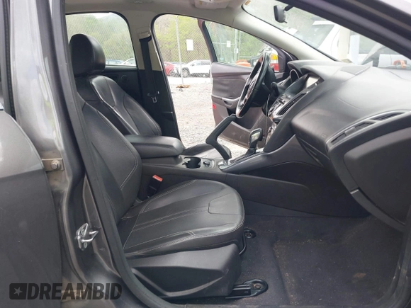 2013 Ford Focus Titanium with VIN 1FADP3J28DL225887, listed as a IAAI auction lot 42122968 with 139,248 mi miles and . Bid and sale history available at carsss.com. Image 5.