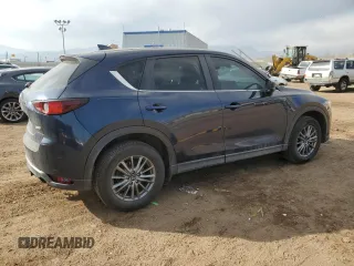 2017 Mazda CX-5 Touring z VIN JM3KFBCL7H0212955, wystawiony jako Copart lot #46096525 z przebiegiem 94 606 mil mil oraz Szkody całkowita. Historia ofert i sprzedaży dostępna na DreamBid. Obrazek 3.