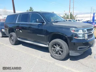 2015 Chevrolet Suburban LT with VIN 1GNSCJKC2FR281629, listed as a IAAI auction lot 41849300 with 133,842 mi miles. Bid and sale history available at carsss.com. Image 1.