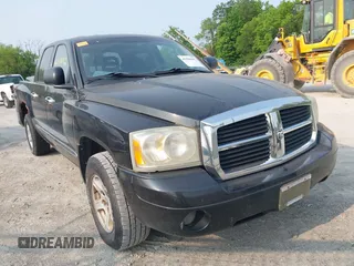 2007 Dodge Dakota SLT z VIN 1D7HW48K97S138512, wystawiony jako IAAI lot #42386042 z przebiegiem 146 629 mil mil oraz . Historia ofert i sprzedaży dostępna na DreamBid. Obrazek 1.