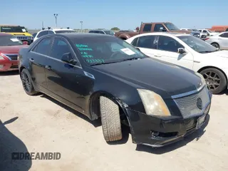 2008 Cadillac CTS RWD w/1SB with VIN 1G6DR57V780213337, listed as a IAAI auction lot 42004973 with 216,869 mi miles. Bid and sale history available at carsss.com. Image 1.
