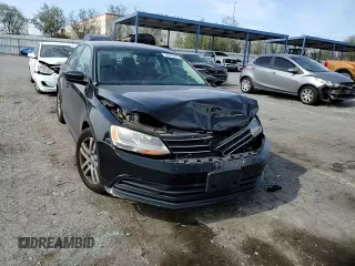 2015 Volkswagen Jetta S with VIN 3VW2K7AJ3FM355363, listed as a Copart auction lot 58516655 with 140,688 mi miles and Salvage title. Bid and sale history available at DreamBid. Image 13.