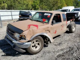 1995 Ford Ranger XLT with VIN 1FTCR15XXSTA40795, listed as a Copart auction lot 74293864 with 147,104 mi miles and Salvage Title. Bid and sale history available at DreamBid. Image 1.