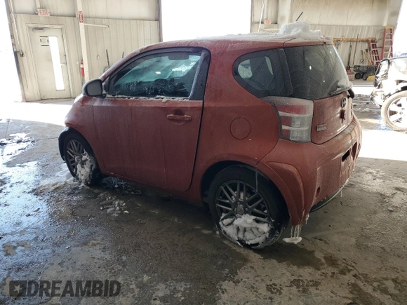 2015 Scion iQ with VIN JTNJJXB09FJ030667, listed as a Copart auction lot 87321594 with 124,895 mi miles and Salvage Title. Bid and sale history available at carsss.com. Image 2.