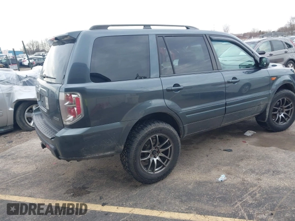 2006 Honda Pilot EX with VIN 5FNYF18426B014815, listed as a IAAI auction lot 42109149 with 284,163 mi miles and . Bid and sale history available at DreamBid. Image 4.