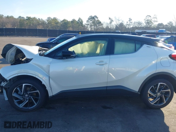 2021 Toyota C-HR LE with VIN JTNKHMBXXM1105546, listed as a IAAI auction lot 41486068 with 87,099 mi miles. Bid and sale history available at carsss.com. Image 14.